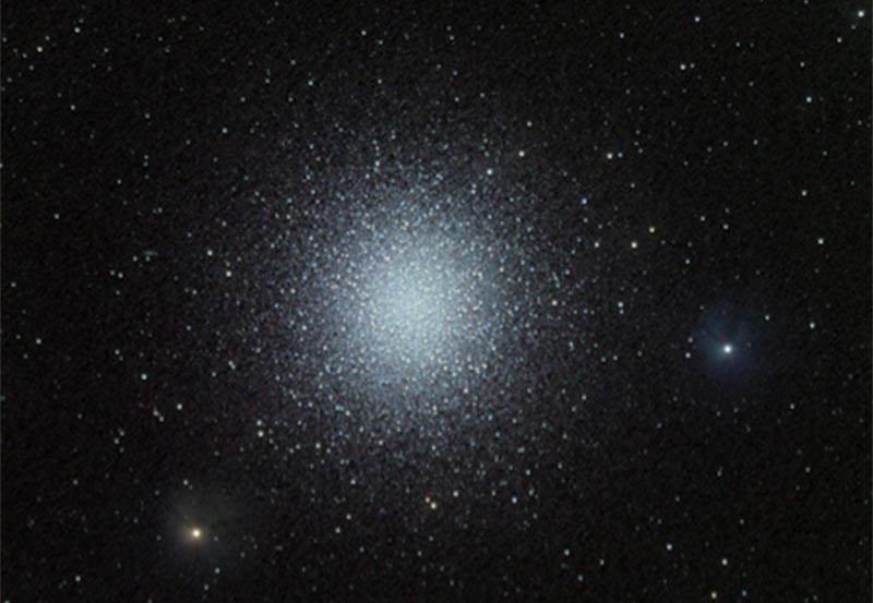 Globular Cluster in Hercules, M13; tight grouping of stars, spherical in shape. 